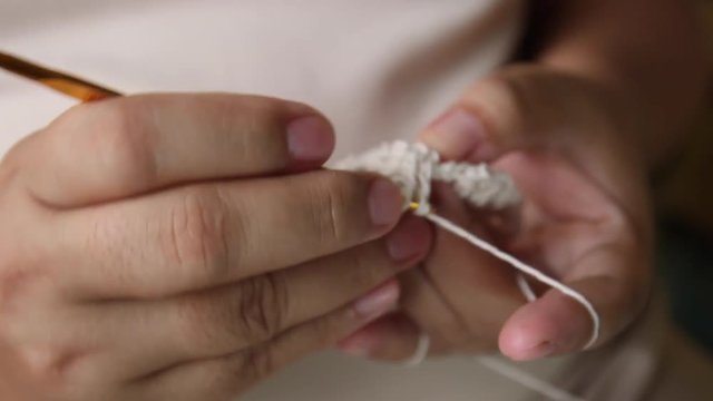Woman Crochet  Closeup over shoulder fast speed