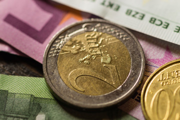 Euro coins and banknotes money. Macro background.
