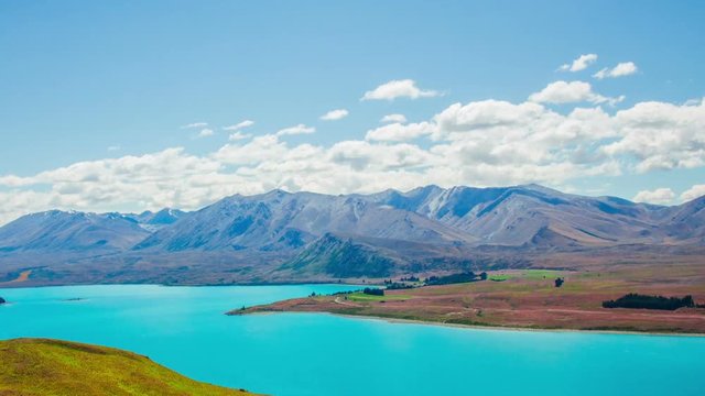Time Lapse - Ariel View of Lake Tekapo with Mountain Range
