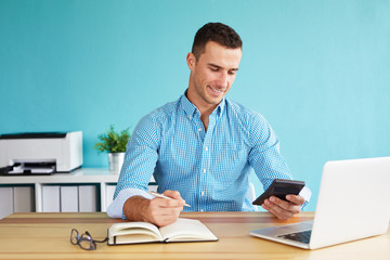 Businessman calculates tax