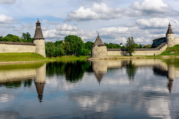 View of the Pskov Kremlin from Velikaya River in the summer in a sunny weather