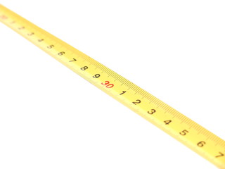yellow measuring tape on white background