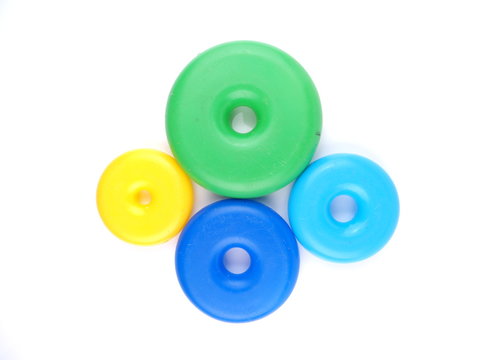 Children colored circles for a pyramid on a white background