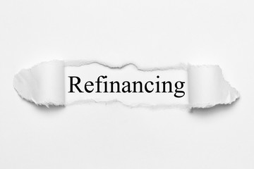 Refinancing on white torn paper