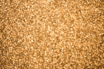 Christmas background. Yellow bokeh festive abstract background with bokeh defocused lights and stars