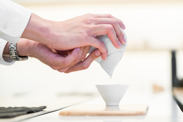 Pouring tea. Chineese tea ceremony
