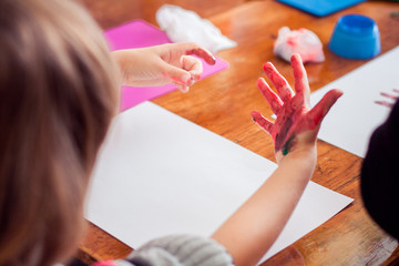 Obraz na płótnie Canvas Closeup of child's painted hand