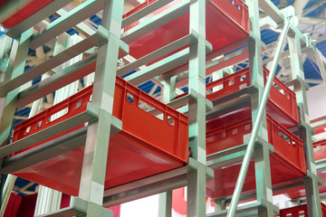 Сonveyor for storage of plastic boxes