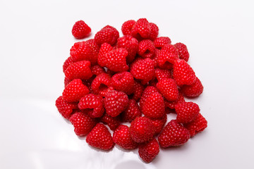 Raspberry berries on a white background