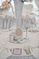 The mirror with number is on the table