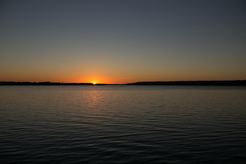 Sunset on a calm lake in Ontario Canada