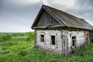 Dilapidated old village house in Russia