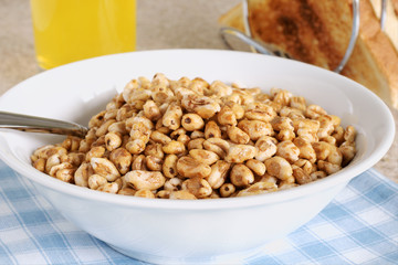 Puffed wheat breakfast cereal