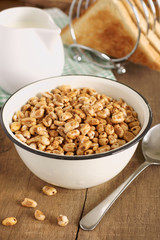 Puffed wheat breakfast cereal