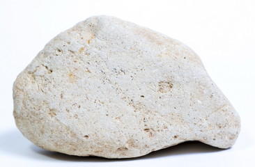 Single natural stone on white background