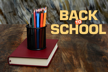 Back to School Concept with Stationery and Book