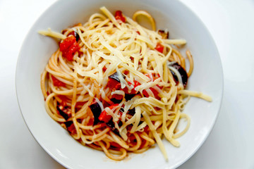 spaghetti with vegetables and cheese