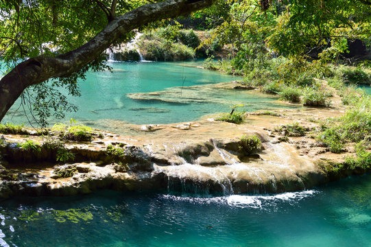Beautiful turquoise pools surrounded by the jungle in Semuc Champey, Alta Verapaz region, Guatemala, Central America