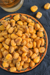 Corn nuts or cornicks a roasted and seasoned maize snack