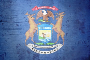 A grunge illustration of the state flag of Michigan 