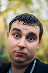 Obraz premium Man surprised face closeup