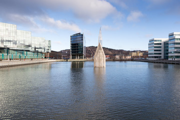 Fototapeta na wymiar Sweden, Vastra Gotaland, Gothenburg, Lindholmen, View of harbor with sculpture of church in water