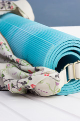 Blue yoga mat in the bag
