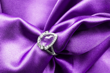 Ring on satin