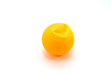Crushed ping pong ball on white background