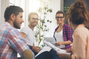 Young business people working at office on new project