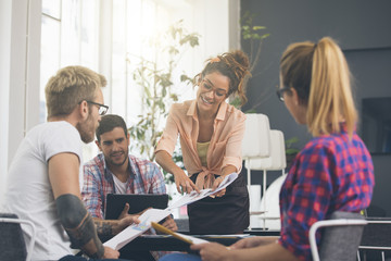 Young business people working at office on new project