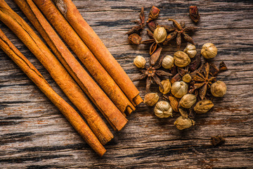 Spices , Cinnamon Stick, Thai Cardamom on wood background
