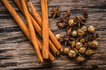 Spices , Cinnamon Stick, Thai Cardamom on wood background