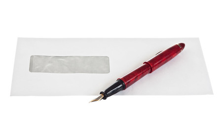 stack of mail envelopes and a pen