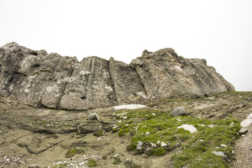 Landscape from Bucegi Mountains, part of Southern Carpathians in Romania in a very foggy day