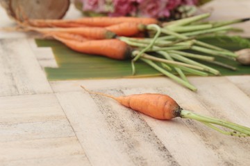 fresh carrot vegetables organic on wood background.