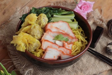 Egg noodles with pork and dumpling is delicious.