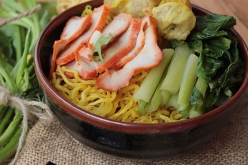 Egg noodles with pork and dumpling is delicious.