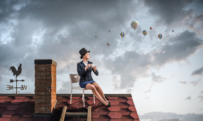 Elegant businesswoman in cylinder hat . Mixed media