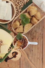 Fried tofu, chinese vegetarian food with sauce.