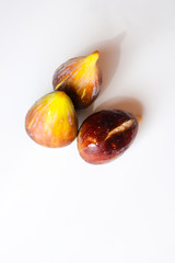 Obraz na płótnie Canvas Closeup on figs fruits on white background
