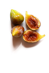Closeup on figs fruits on white background