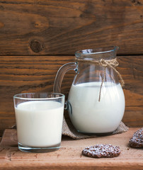 milk with chocolate biscuits cereals. Selective focus. Vertical