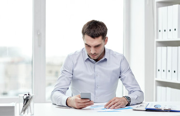 close up of businessman with smartphone