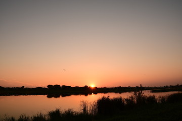Fototapeta na wymiar Sunset on the lake in Japan.