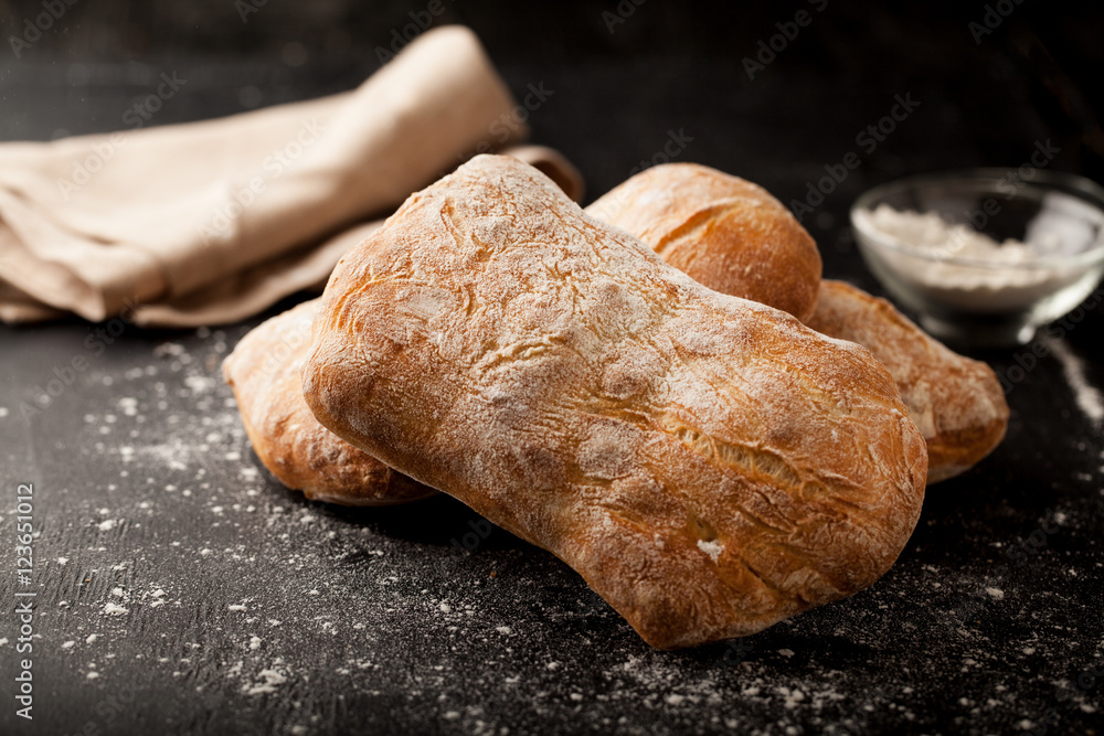 Wall mural Ciabatta bread and flour