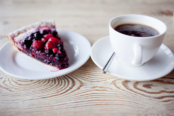 Breakfast from cappuccino and cheese-cake dessert in cafe, close-up
