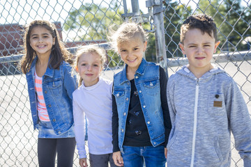 students outside school standing together