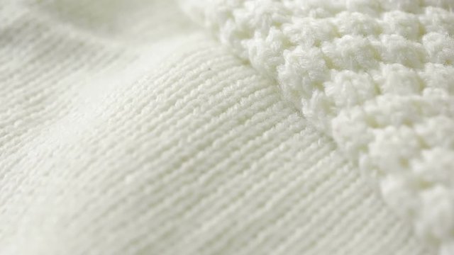 white knitted wool texture. use as background. close-up