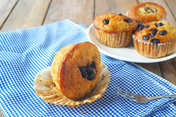 Close up of homemade banana muffins on a napkin.